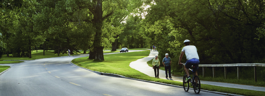 Cyclists ride on a bike path